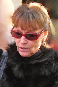 Angelica Domröse als Paula in einer Szene aus dem DEFA-Kultfilm 'Die Legende von Paul und Paula' von 1973, mit nachdenklichem Blick.