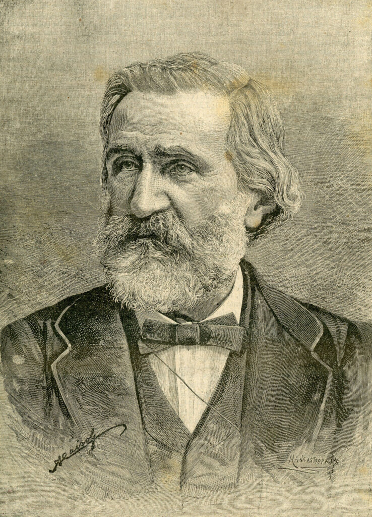 Giuseppe Verdi in einer Porträtaufnahme um 1890, mit weißem Bart und ernstem Blick, der die Reife seiner späten Schaffensphase widerspiegelt.