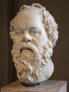 Marmorbüste des griechischen Philosophen Sokrates mit nachdenklichem Ausdruck und charakteristischem Bart, römische Kopie eines griechischen Originals.