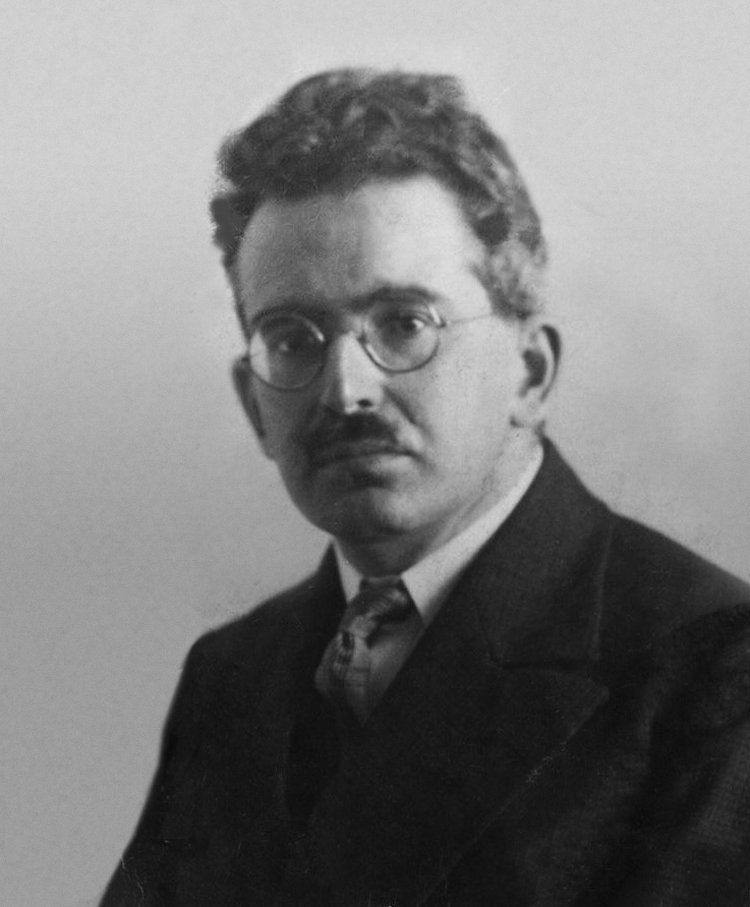 Walter Benjamin in einem Pariser Café, nachdenklich, in den 1930er Jahren. Eine Aufnahme, die den Intellektuellen im Exil zeigt.