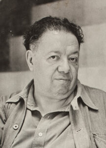 Der Maler Diego Rivera bei der Arbeit an einem seiner Wandgemälde, eine undatierte Fotografie aus den 1930er-Jahren.