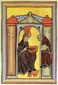 Miniatur aus dem Lucca-Kodex, die Hildegard von Bingen zeigt, wie sie inspiriert von Visionen ihre Schriften diktiert, um 1175.